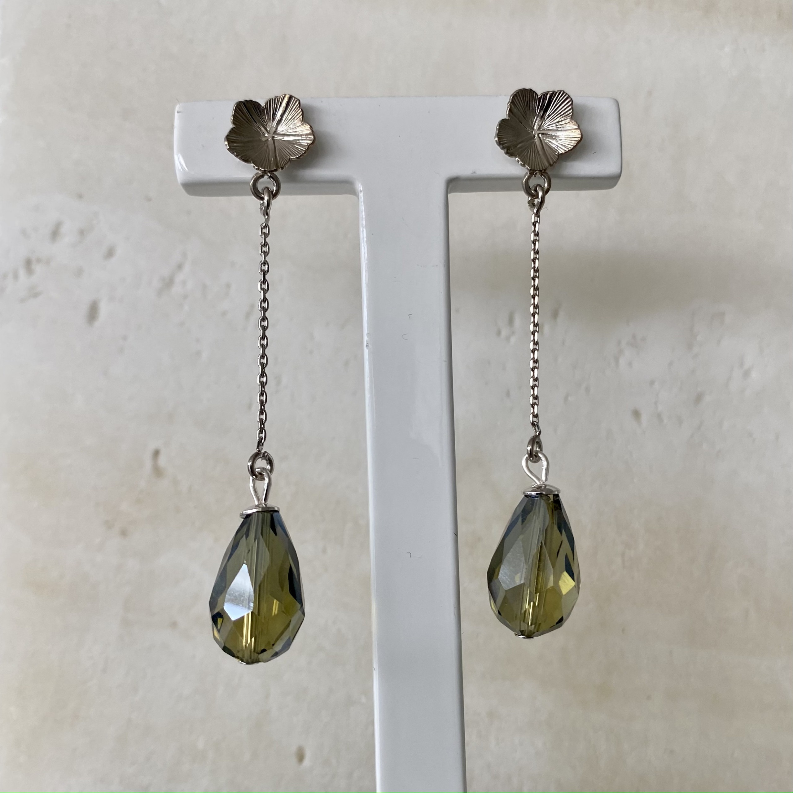 Silver petal long green drop earrings