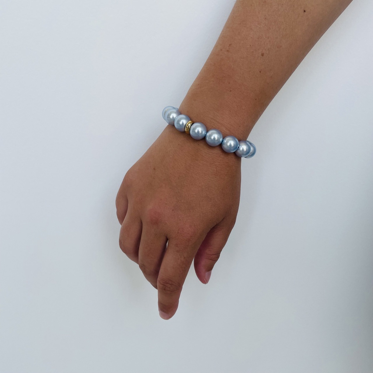 Bracelet light blue pearls